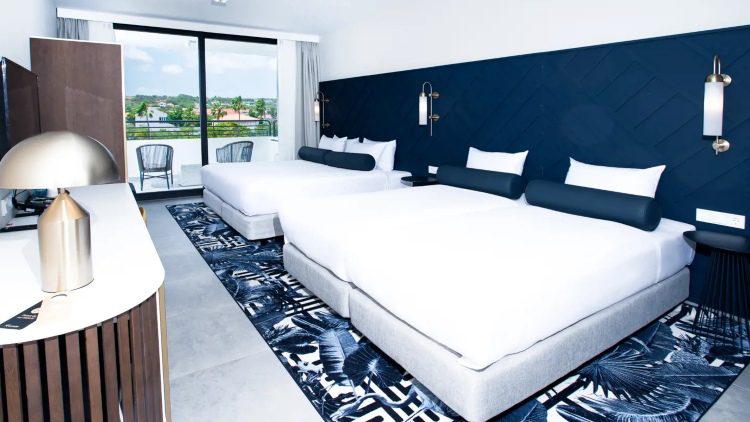 rooms corendon mangrove beach resort curacao queen beds 750x422 1